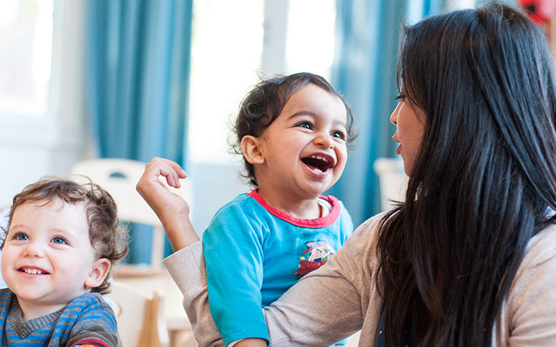 Teacher with young baby